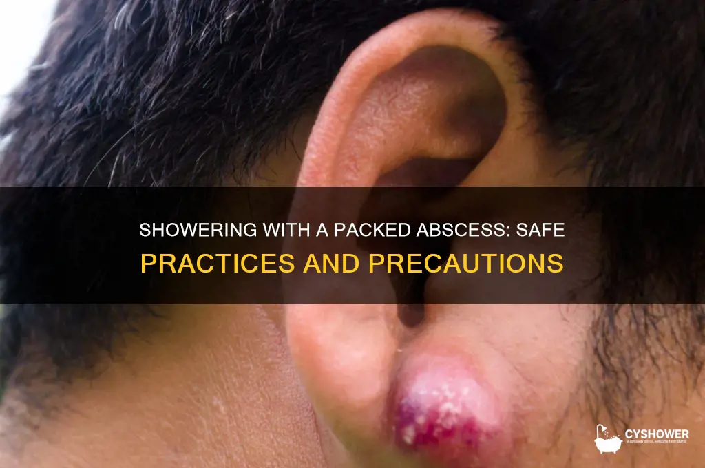 can i shower with a packed abscess