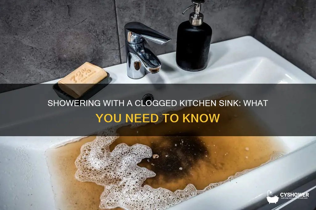 can i take a shower with a clogged kitchen sink