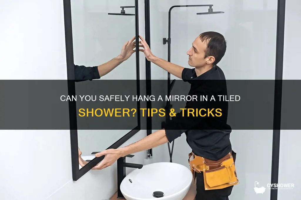 can you hand a mirror in a tile shower