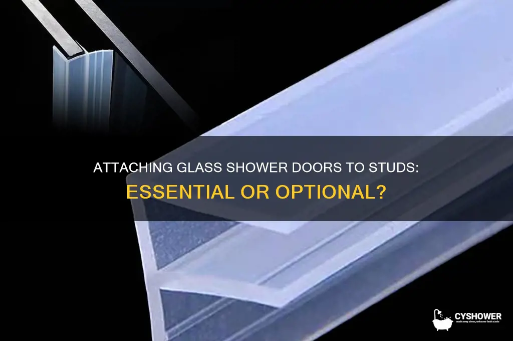do glass shower doors need to be attached to studs