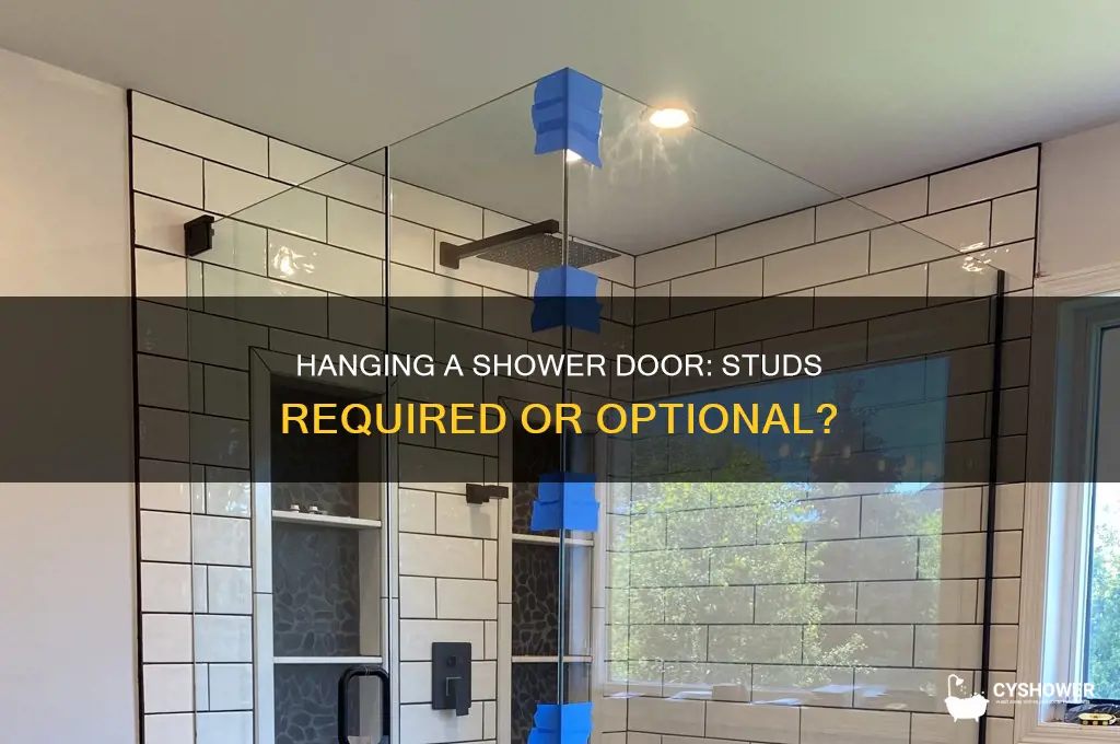do i need studs to hang a shower door