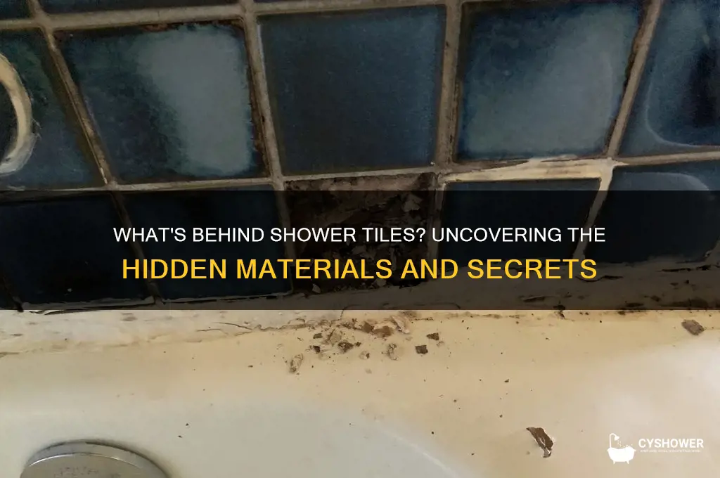 do they put anything behind tiles in a shower