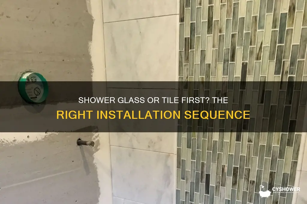 do you install shower tile or shower glass first