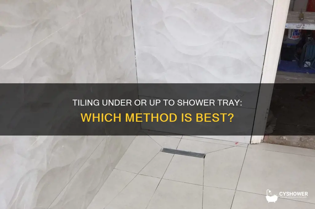 do you tile up to or under a shower tray