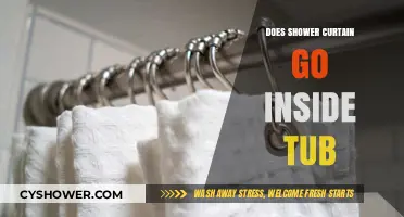Shower Curtain Placement: Inside the Tub or Outside?