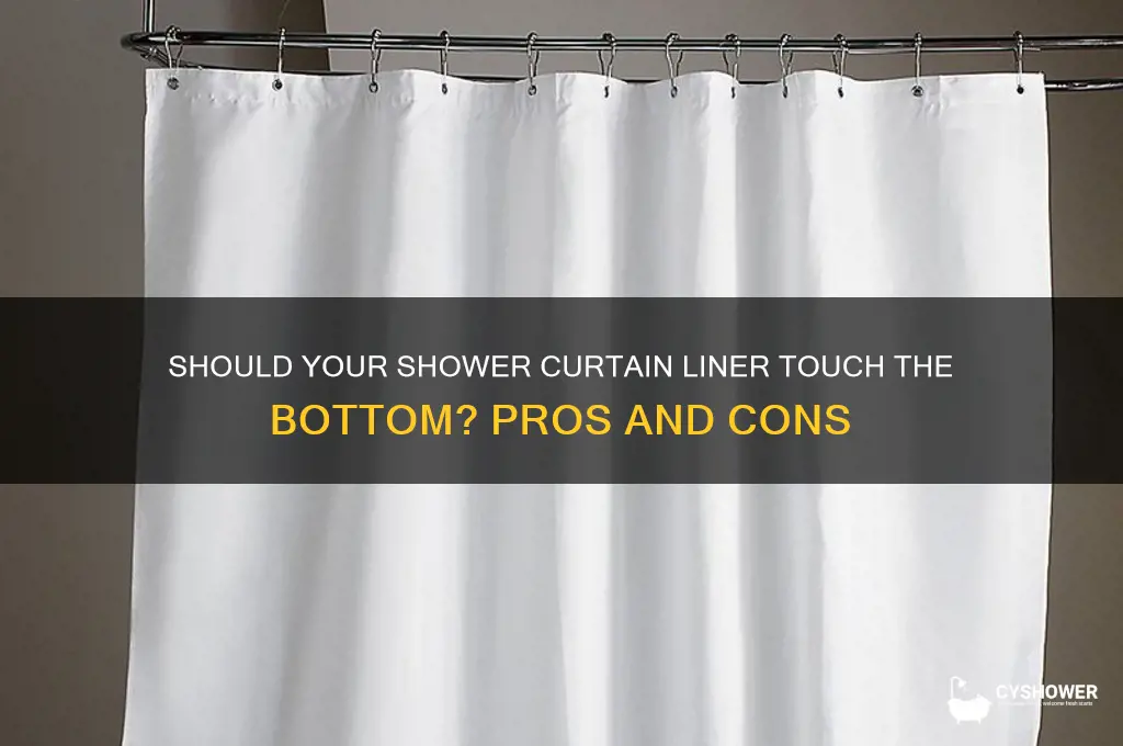 does the shower curtain liner touch the bottom