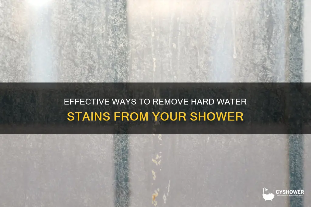 how do i dissolve hard water off my shower