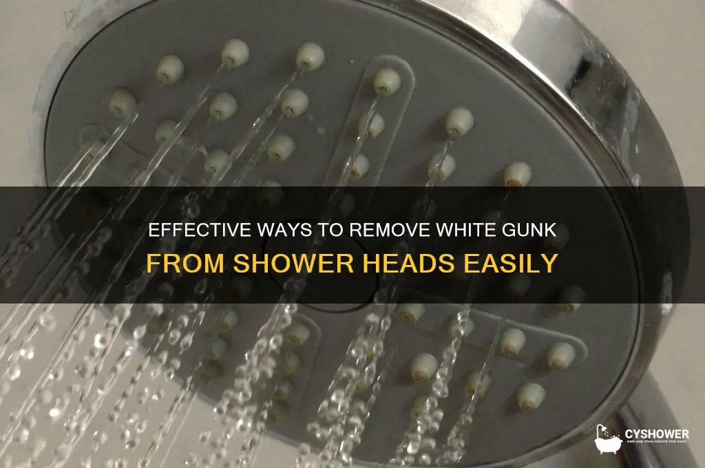 how do i get the white gunk off shower hear