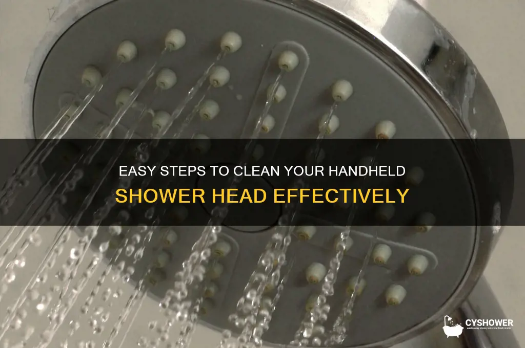 how do you clean a hand held shower head