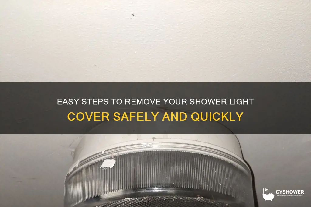 how to get shower light cover off