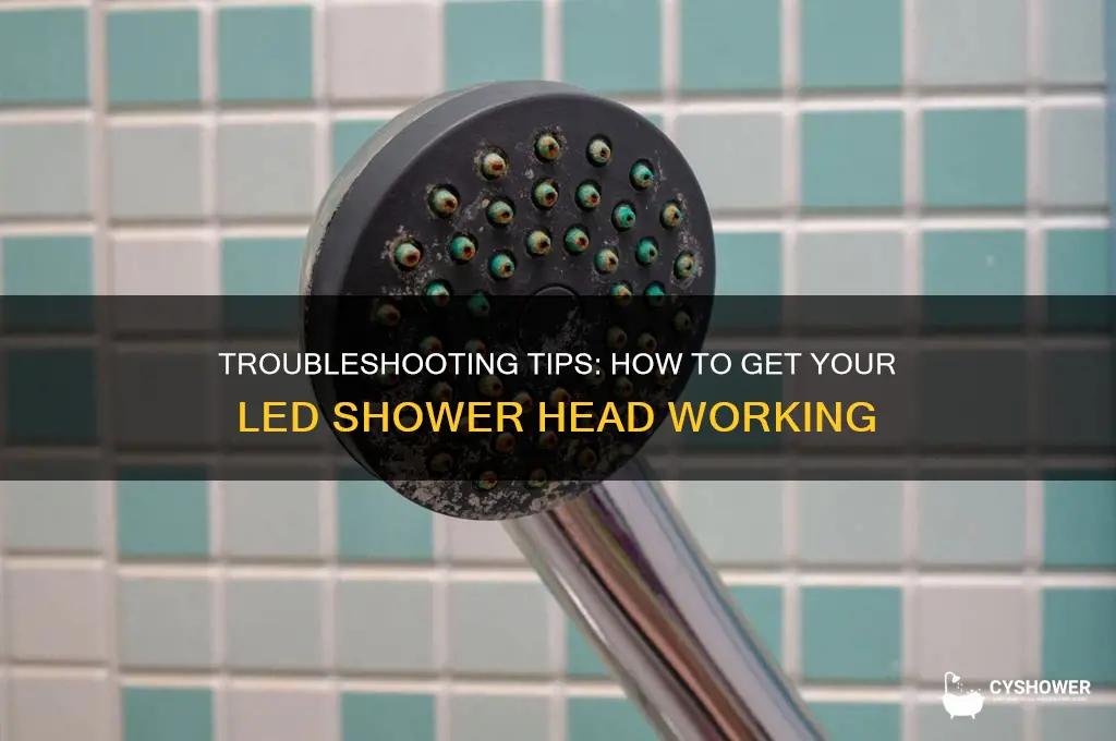 how to get the led shower head to work