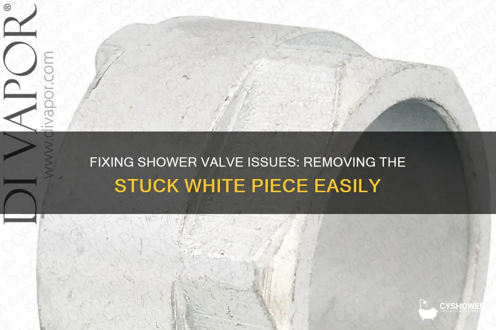 how to get the white piece out of shower valve