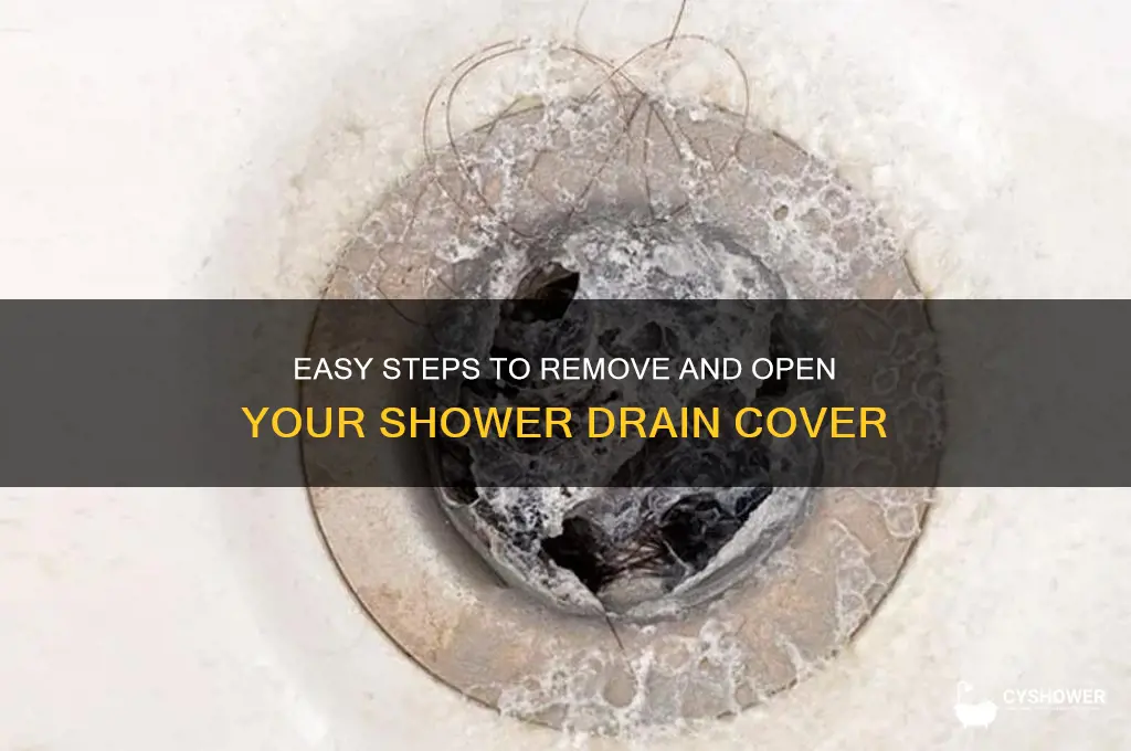 how to open a shower drain cover