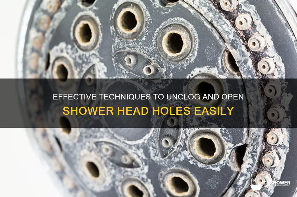how to open shower head holes