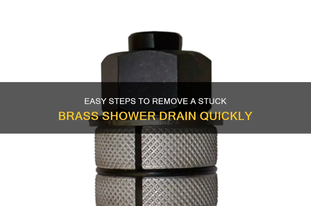 how to remove a brass shower drain