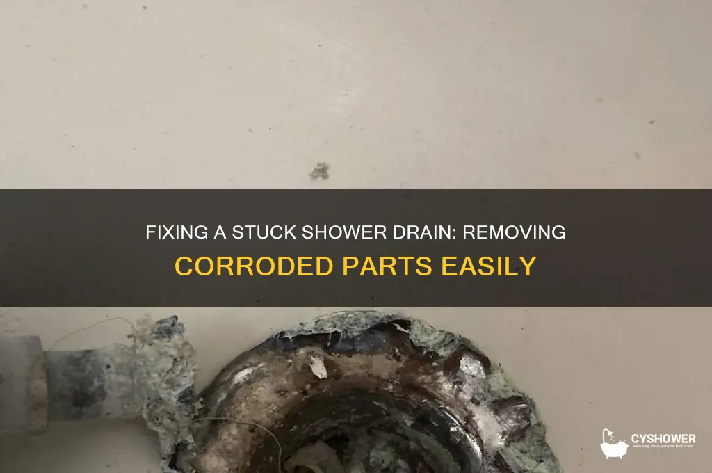how to remove a corroded shower drain