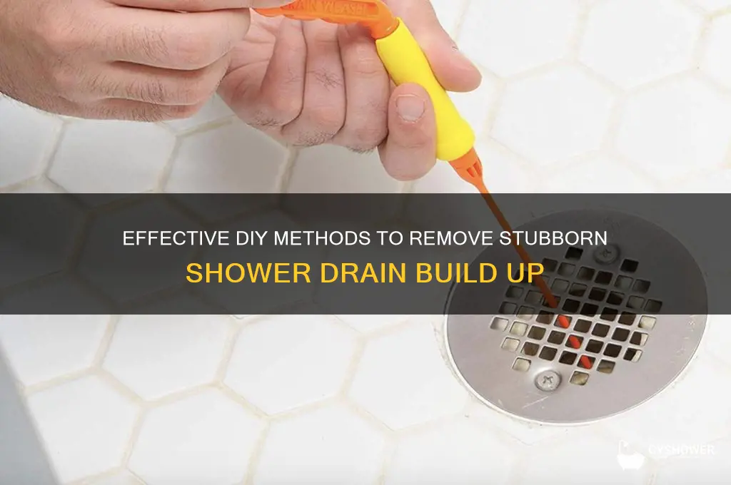 how to remove shower drain build up