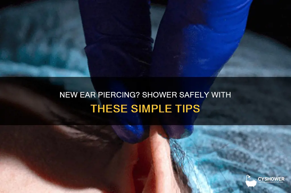 how to take a shower with a new ear piercing