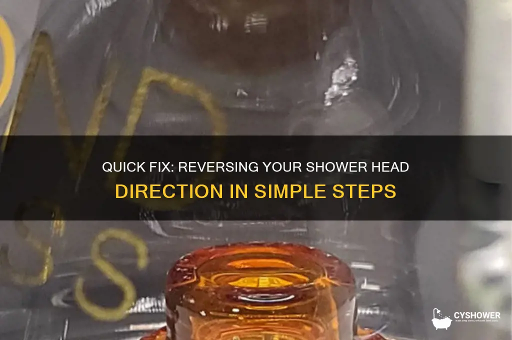 how to turn the shower head the opposite direction