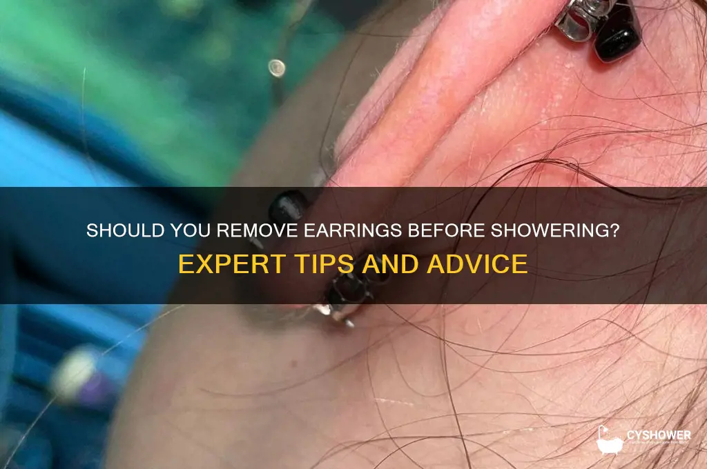 should i take earrings out to shower