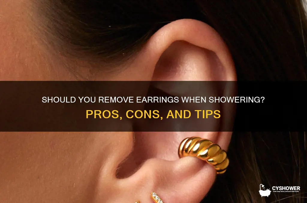 should i take my earrings out when i shower