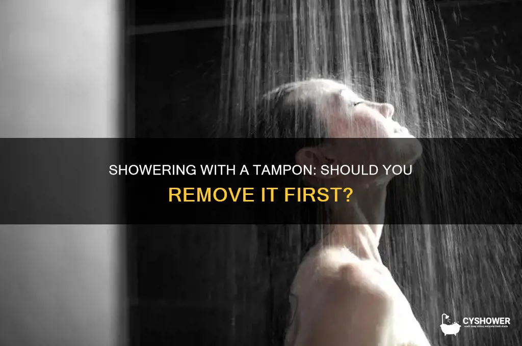 should you take your tampon out to shower