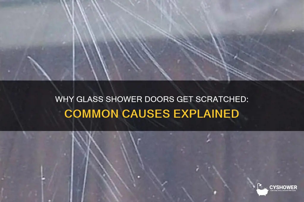what causes scratches on glass shower door