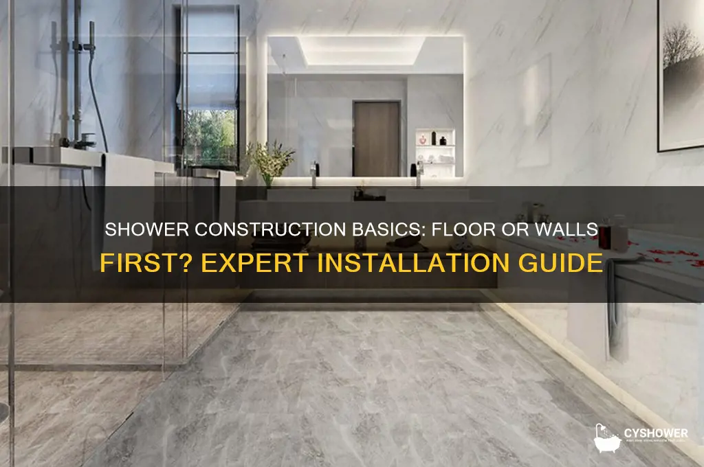 what gets installed first floor or walls in a shower