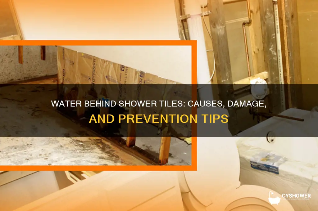 what happens if water gets behind shower tiles