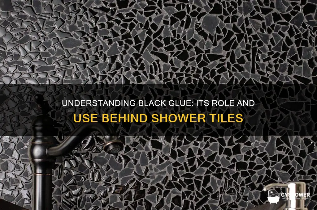 what is black glue behind shower tiles