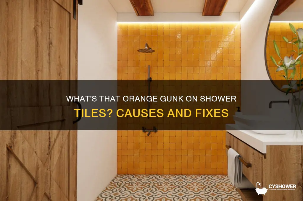 what is the orange stuff on my shower tile