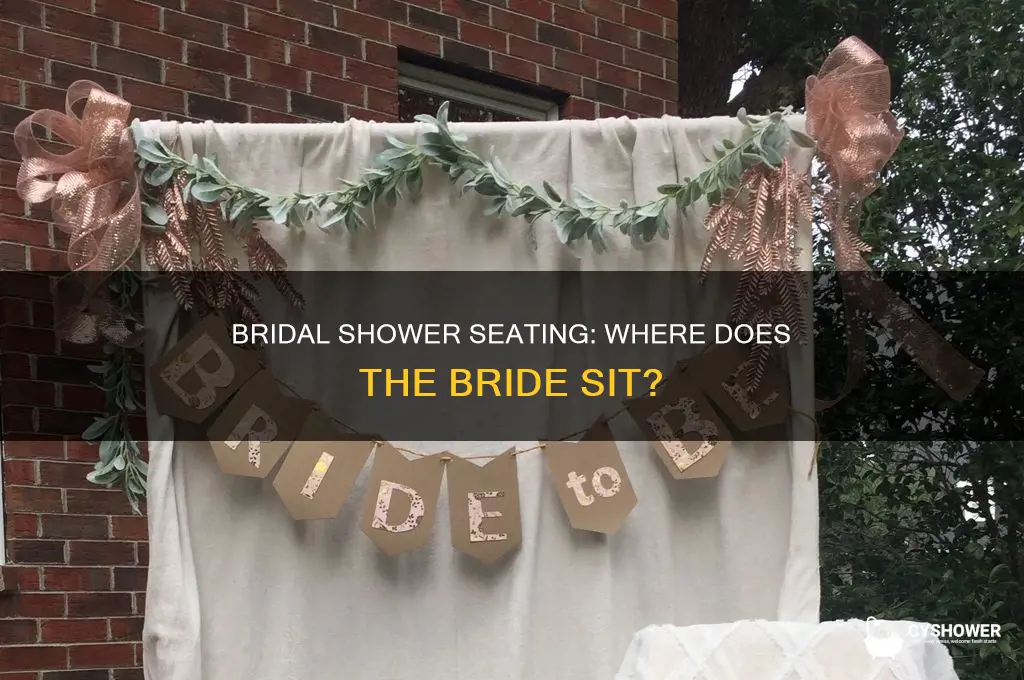 who does the bride sit with at a bridal shower