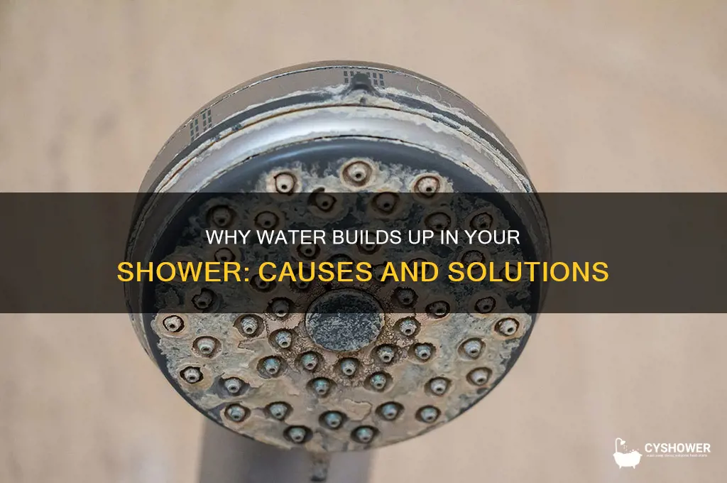 why does water build up in shower