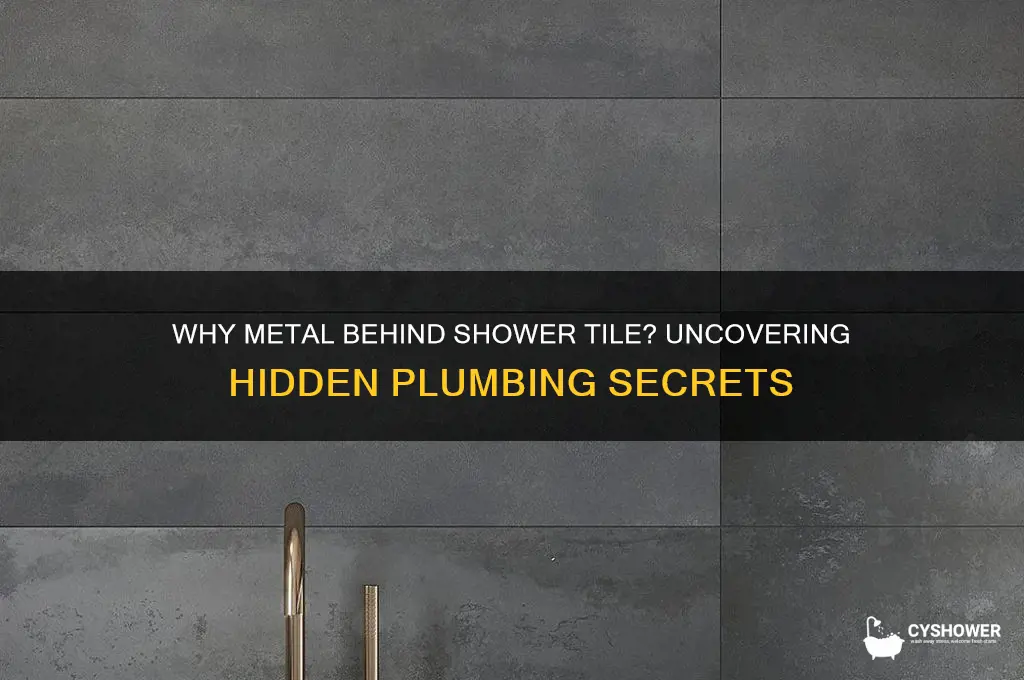 why is there metal behind my shower tile